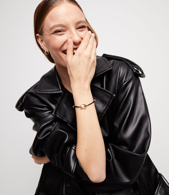 Black cord bracelet with a pearl